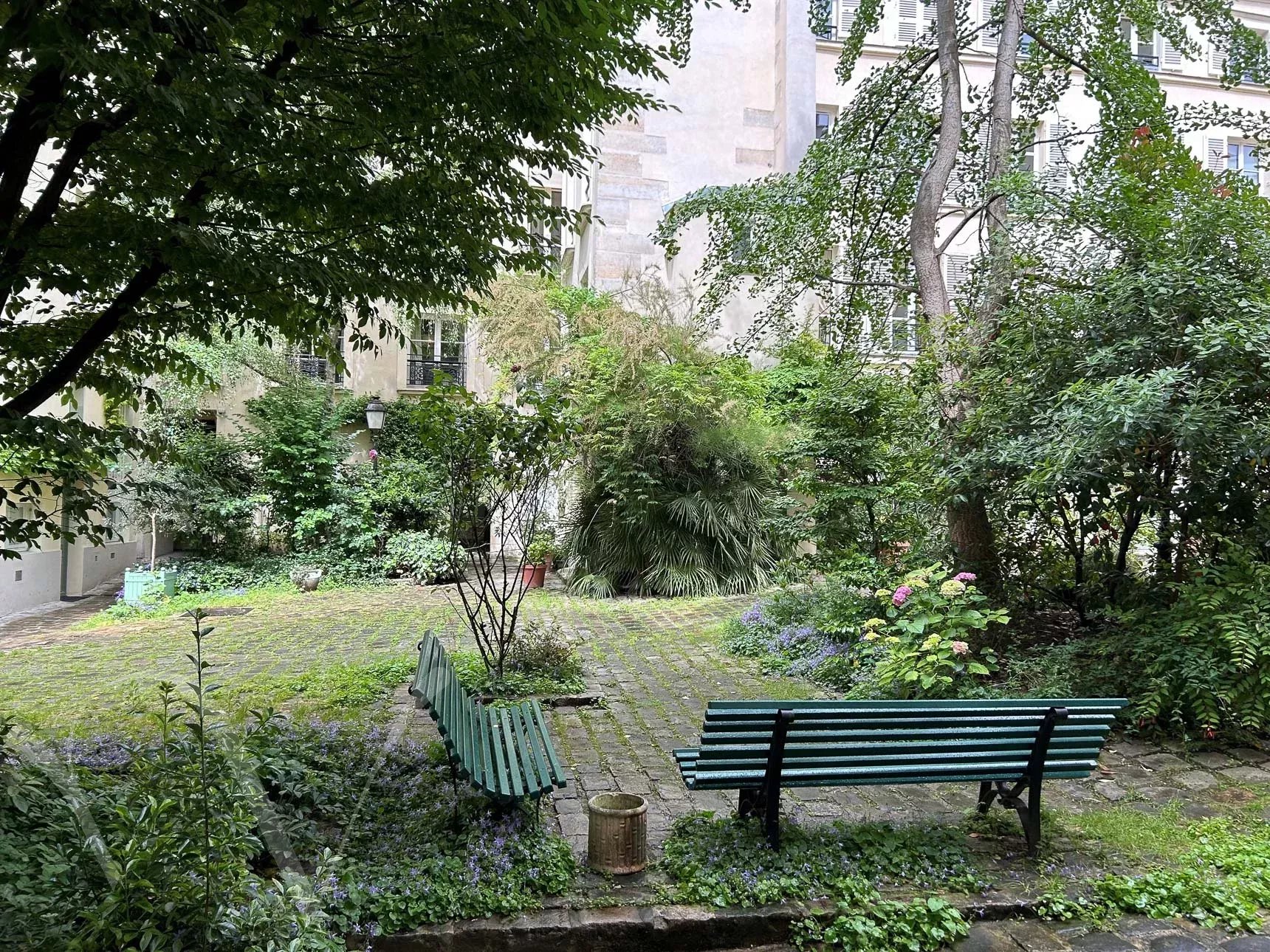 Appartement à vendre au coeur du Marais historique – Duplex sur jardin Paris 75004